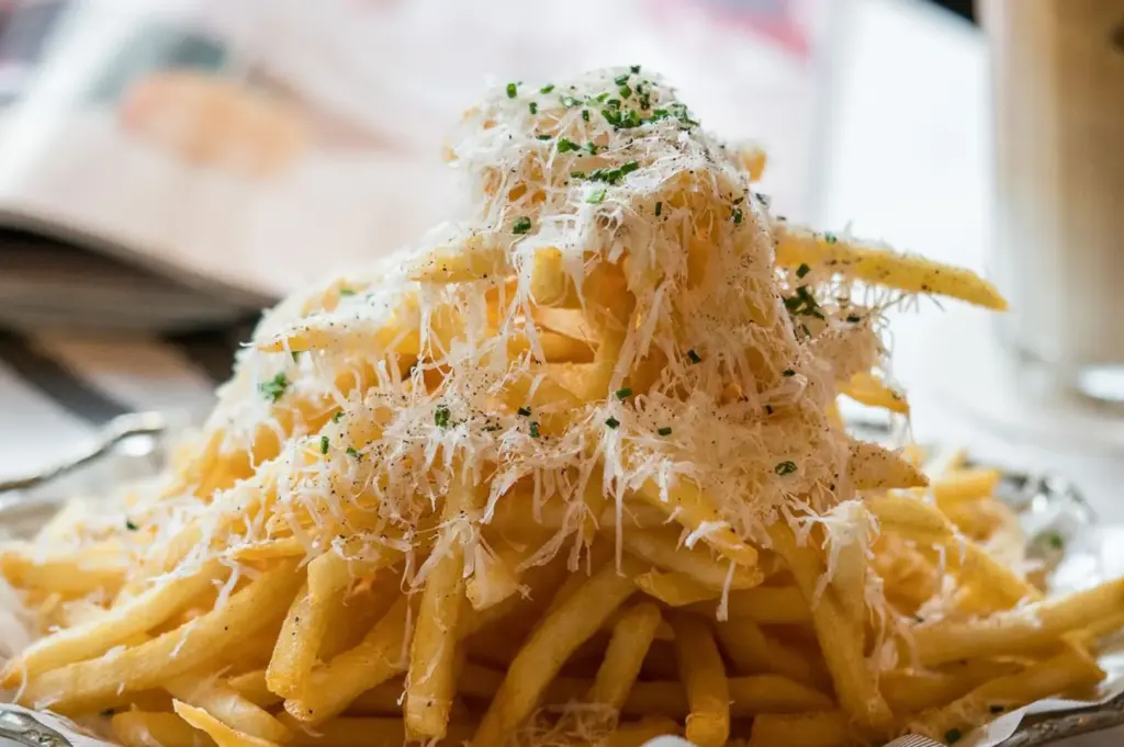 Truffle fries topped with grated cheese at PS.Cafe Singapore.