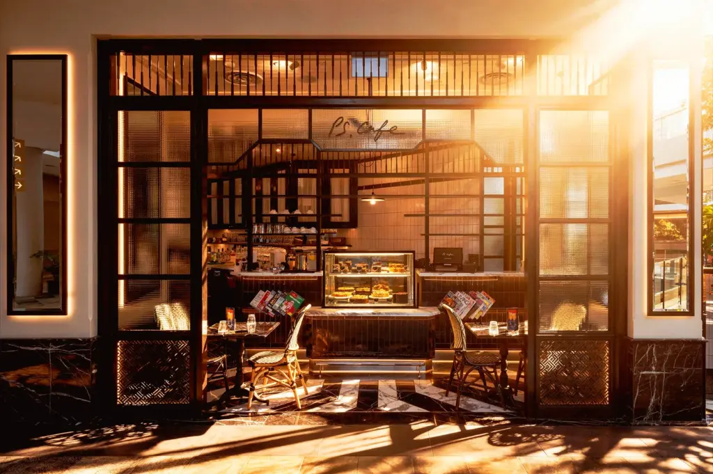 PS Cafe Marina Bay Sands Singapore in morning light with soft shadows, empty seating, and calm minimalist cafe atmosphere at 9AM