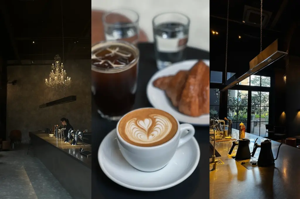 Modern dark cafe interior with high ceilings, crystal chandeliers, and natural light from large windows