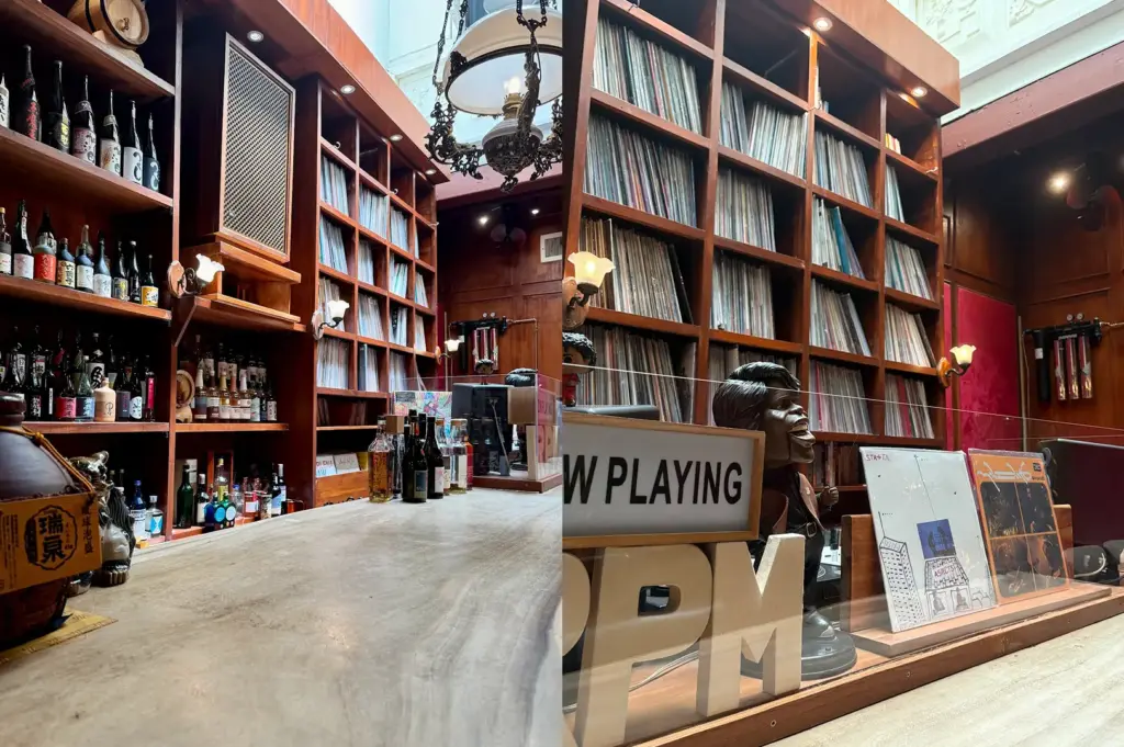 Vinyl listening station and bar counter with display of vinyl shelves