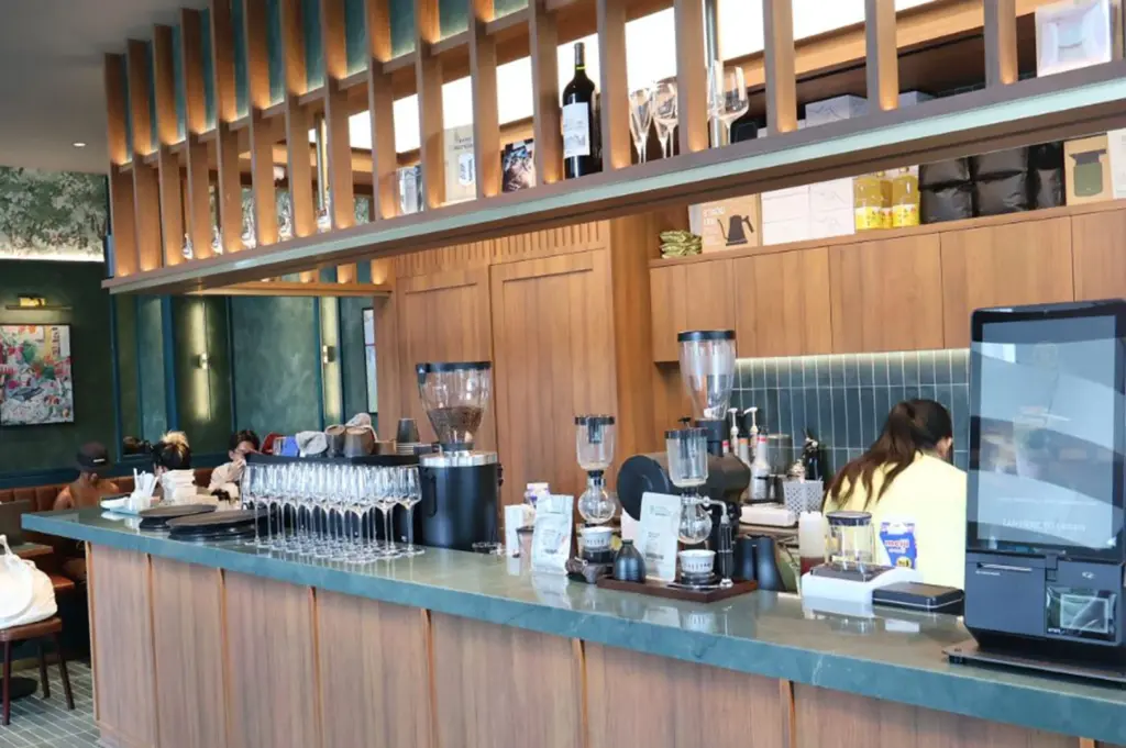 Cafe Yasuragi coffee bar with wooden counter.